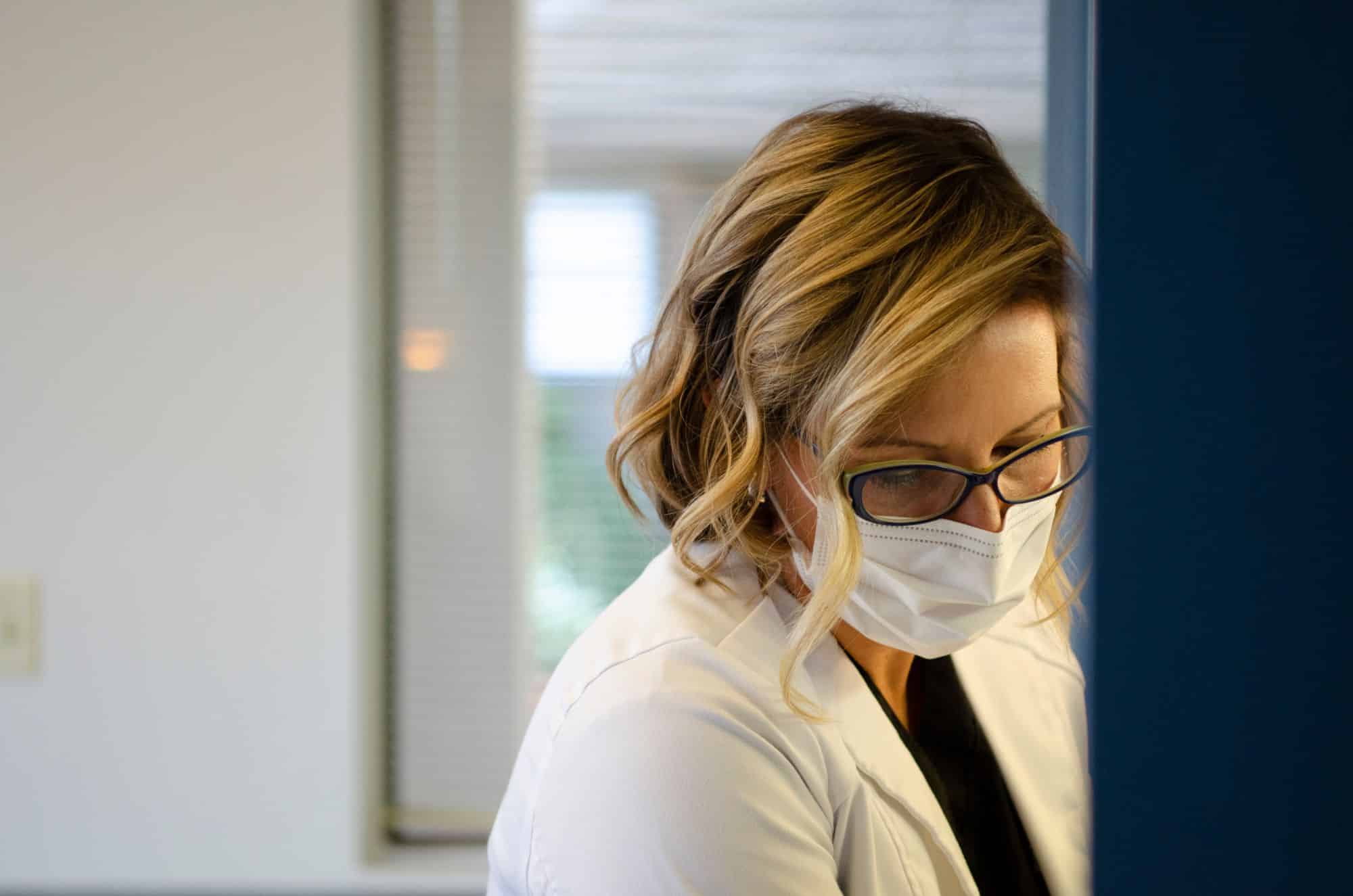 Dr. Laidlaw with patient