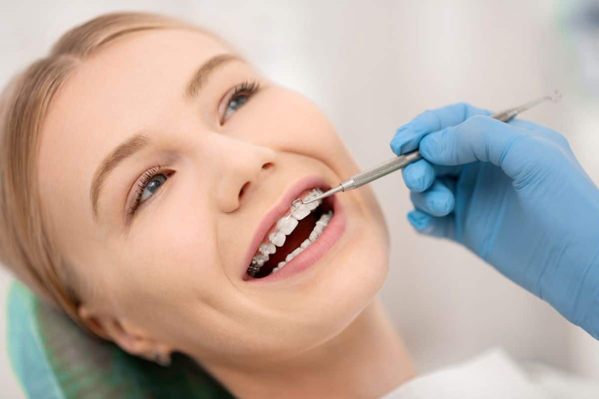 female patient getting braces for facial alignment